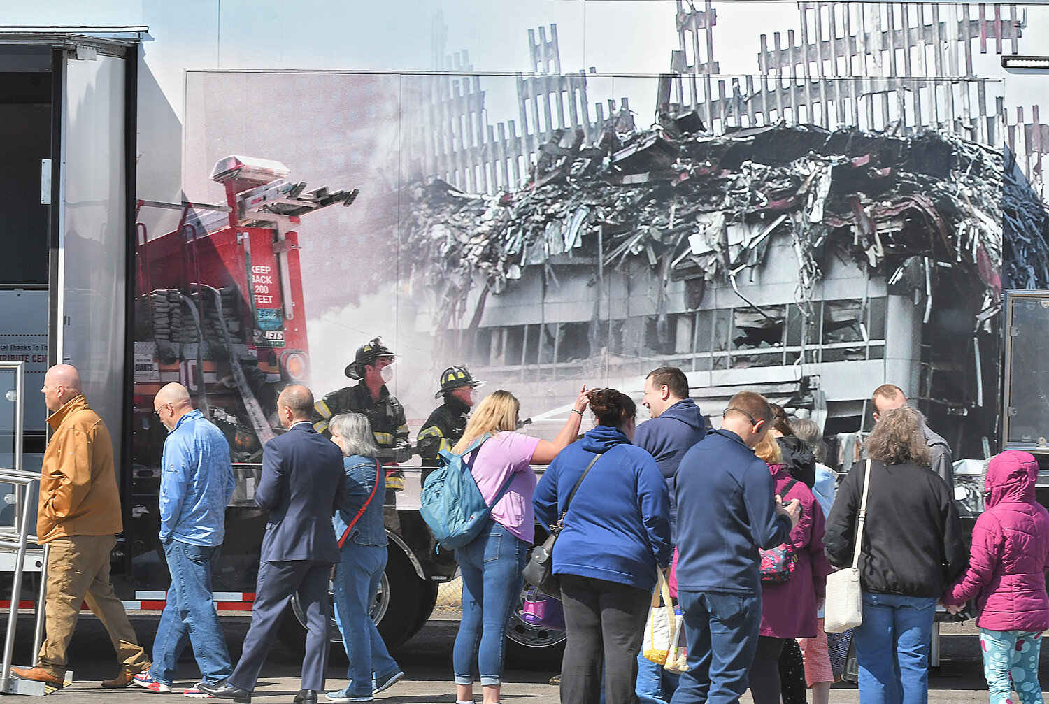 People line up to tour the Tunnel to Towers 9/11 Never Forget Mobile Exhibit at the Griffiss Technology Park. The mobile exhibit will be free and open to the public through Sunday, April 20-23 from 10 a.m. to 4 p.m. each day.