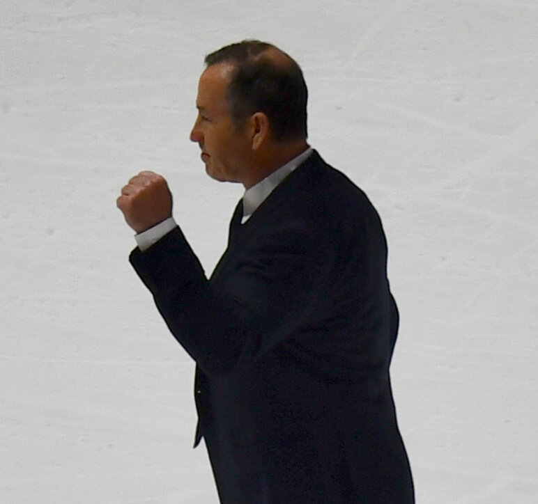 Utica Comets coach Kevin Dineen acknowledges the crowd as he walks off the ice following the team's 2-1 overtime win over the Laval Rocket on Friday in the North Division first round game. The Comets earned a sweep in the best-of-three playoff series to advance and play Toronto.