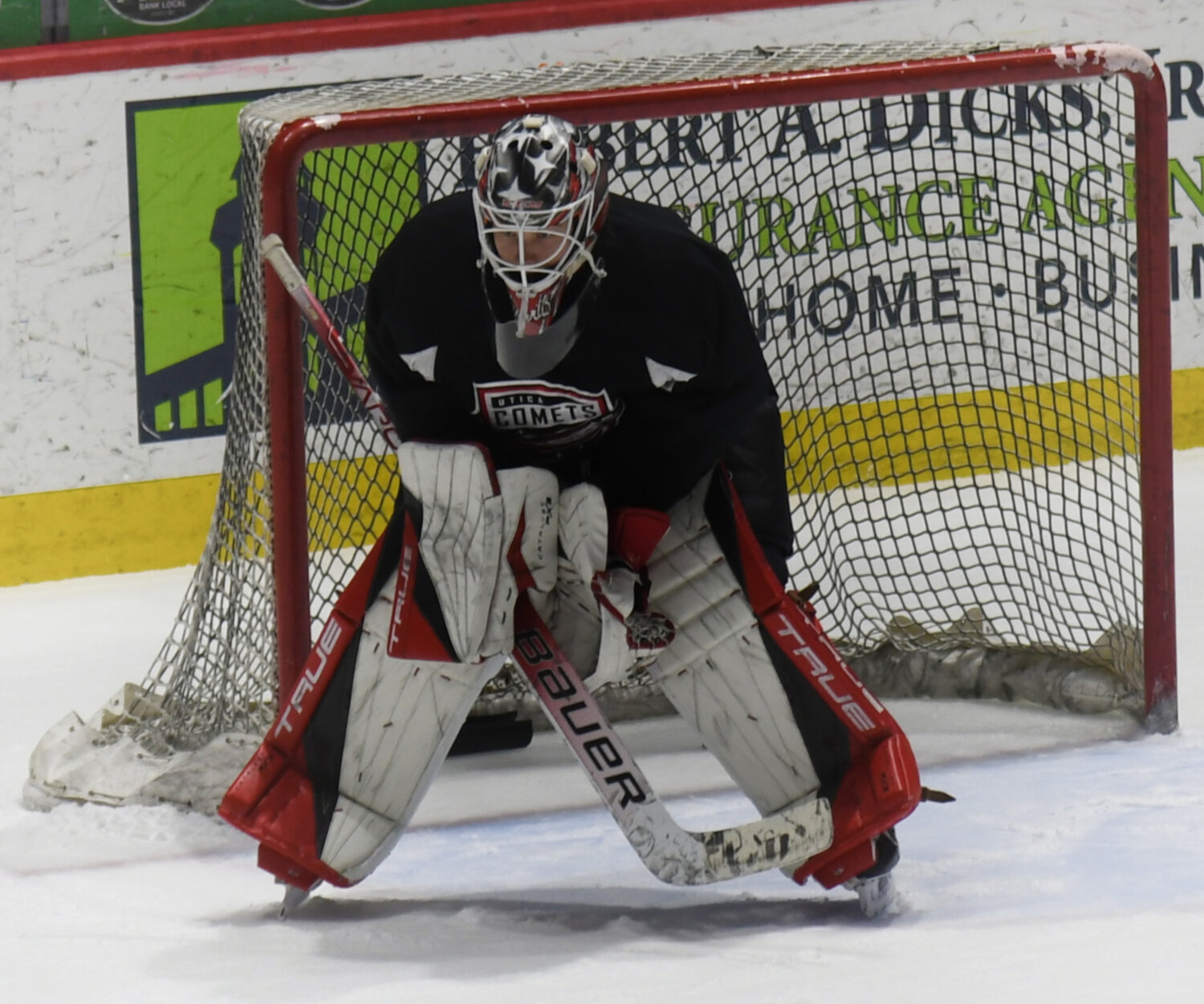 Isaac Poulter looks on during practice Tuesday at the Adirondack Bank Center. The team announced Tuesday Poulter — who has played with the team on an AHL deal this season — is signed to an AHL contract for the 2023-24 season.