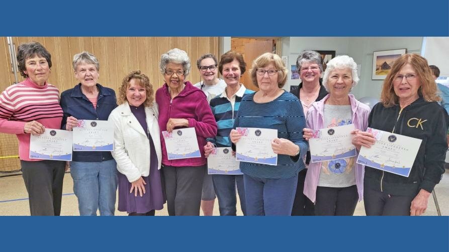 Pictured are, from left, Phyllis Didio; Brenda Reid; Susan Streeter, executive director of CCCC; Jeanne McDowell; Priscilla Wiley; Ruth Weltz; Pat Wyman; Darlene Hertel; Barbara Hill; and Mary McNeill as they are presented with Presidents Active Lifestyle Award certificates and Walmart gift certificates.