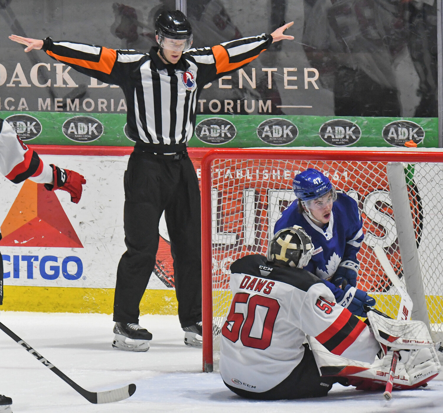 A referee waves off a goal by the Toronto Marlies in the middle of the first period of Wednesday's North Division semifinal Game 3 in Utica. Goalie Nico Daws sits in the crease with Toronto's Topi Niemela in the goal. The Marlies won 5-2 so Utica must now win Games 4 and 5 or be eliminated from the postseason.