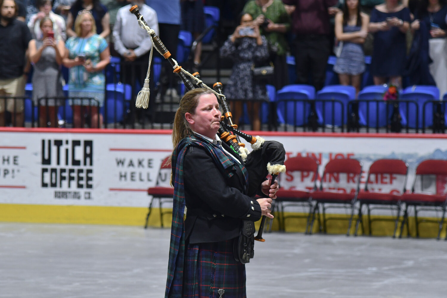 As is Utica University tradition, bagpipes are played at the beginning of the undergraduate commencement ceremony to bring out the university's administration and faculty before welcoming in the graduating class.