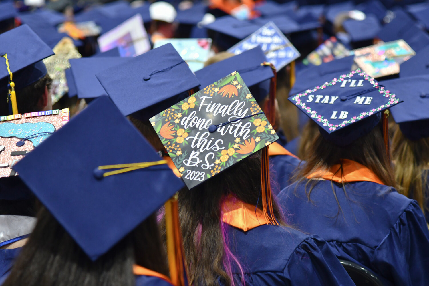 Among the sea of graduation caps at Utica University's 74th undergraduate commencement ceremony, many of them showed messages of inspiration and determination, even some tongue-in-cheek statements like "Finally done with this B.S. (bachelor of science)"