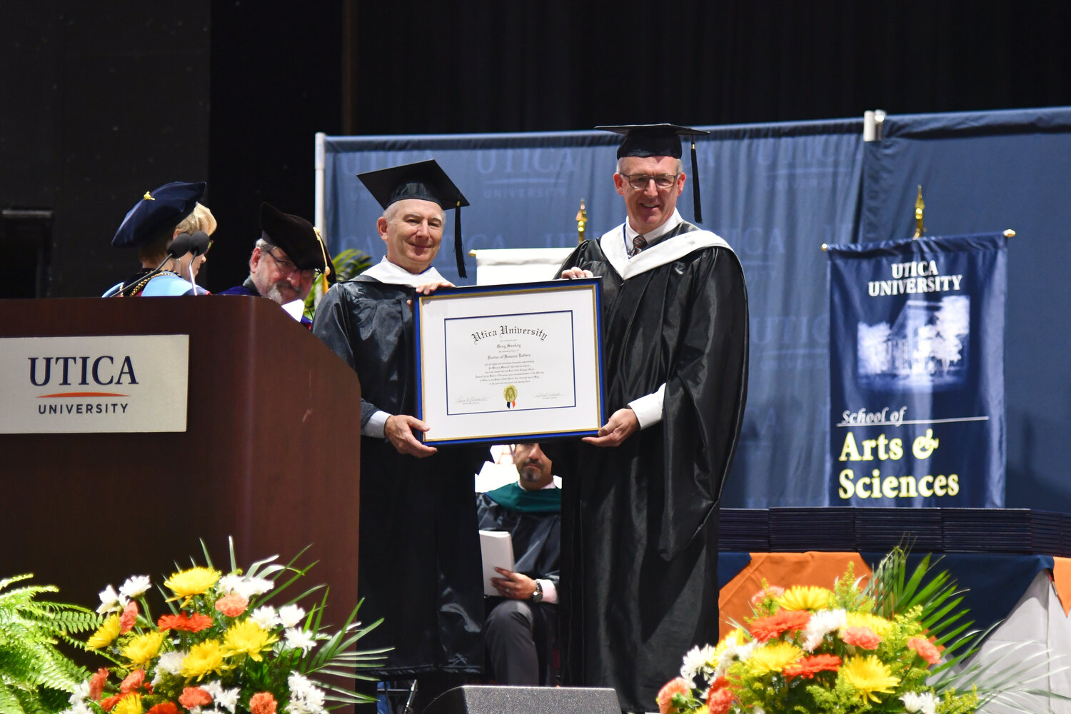 In addition to being the Utica University 74th undergraduate commencement keynote speaker, SEC Commissioner Greg Sanky was awarded the honorary Doctor of Humane Letters degree by the university.