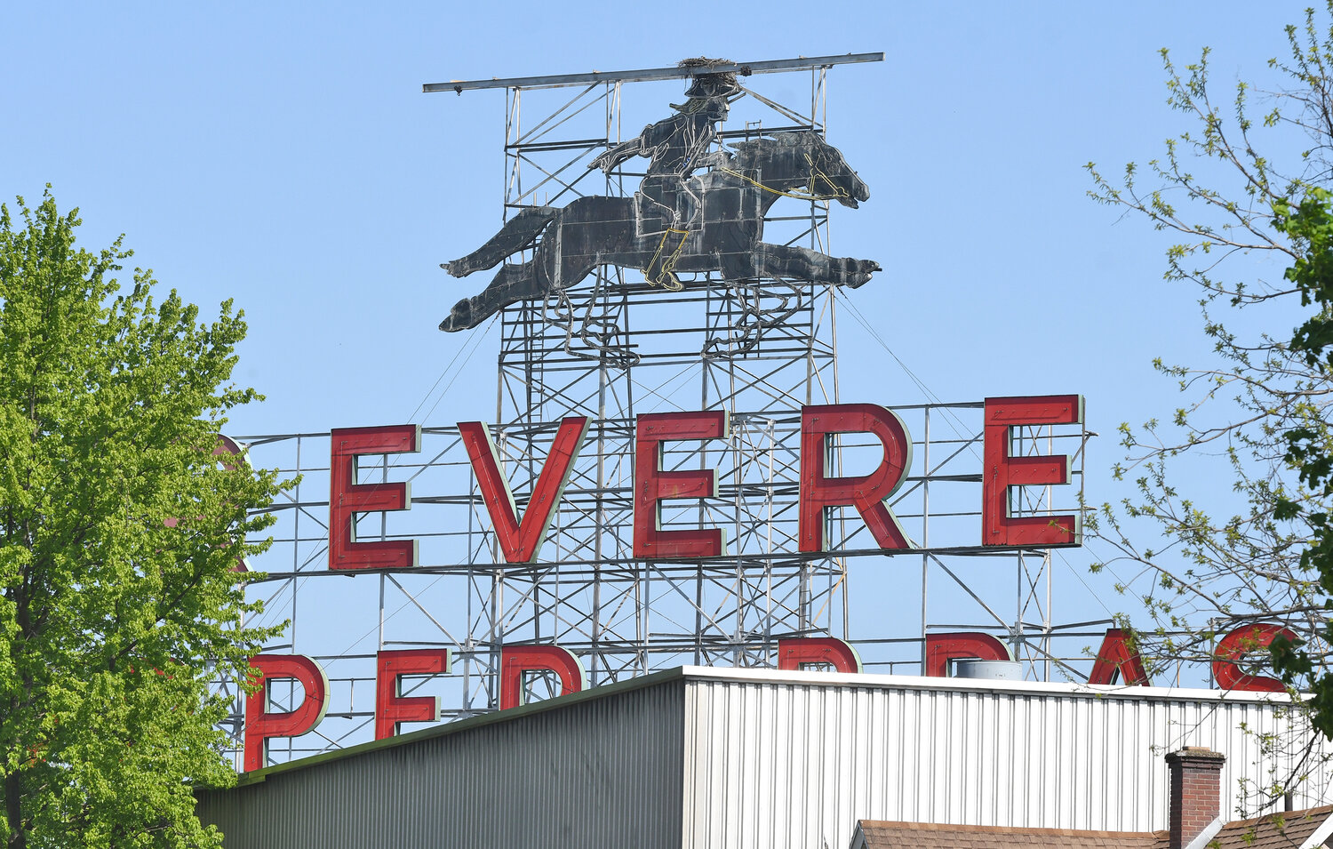 The Paul Revere sign as it looks today atop Revere Copper on East Dominick Street, taken on Friday, May 12, 2023. Mike O’Shaughnessy, president and CEO, said they are hoping to repair and relight the sign by July 4, 2024.