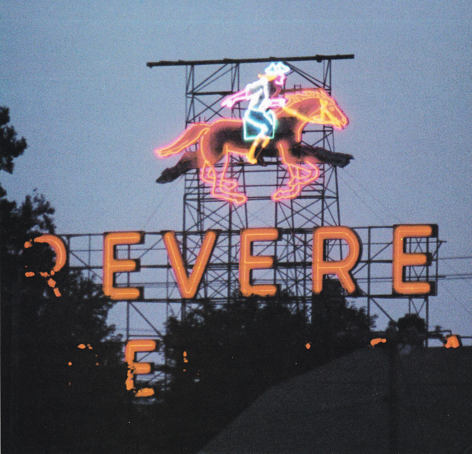 The Paul Revere sign as it looked in 2001, bright and colorful atop Revere Copper Products. The lighting was animated to look as if the horse was running, helping patriot Paul Revere make his famous warning.