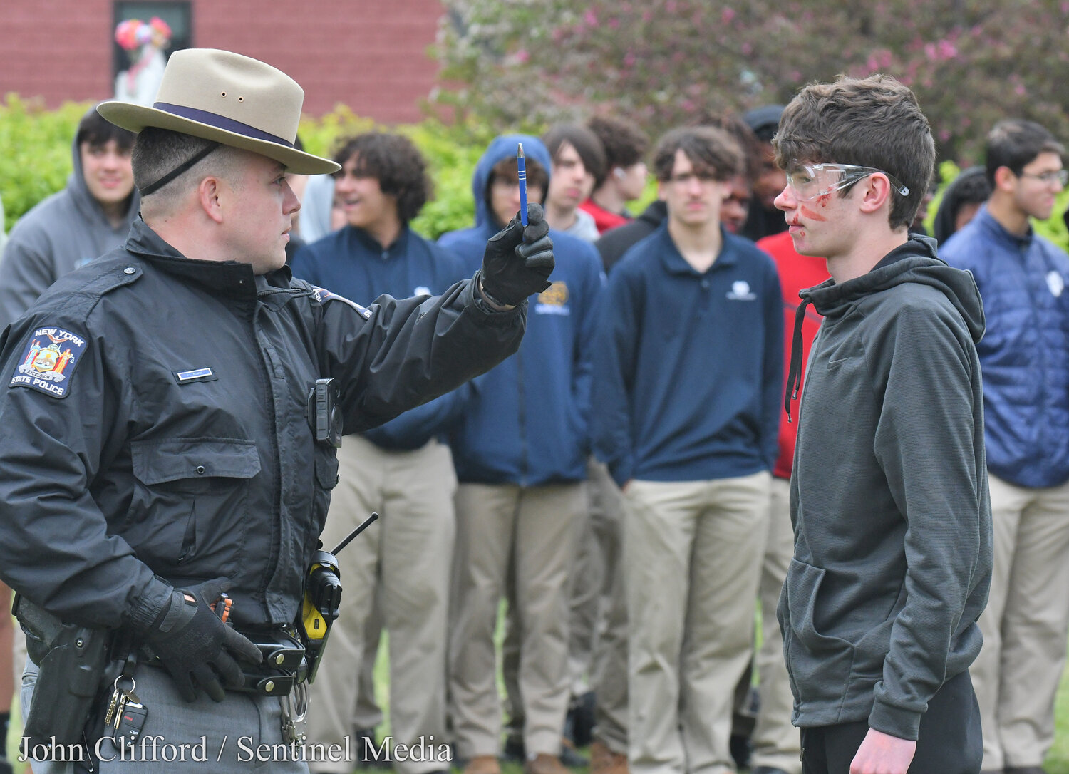 New York State Police Trooper Victor Ramos - a drug recognition expert - does a SFST (Standardized Field Sobriety Testing) on Notre Dame senior Peter Crescio. Students at Notre Dame Junior/Senior High School in Utica  had an up-close look at the potential tragic consequences of drunk driving  on May 17, 2023. A Mock DWI crash scene was set on the school’s front lawn that brought  dozens of first responders.