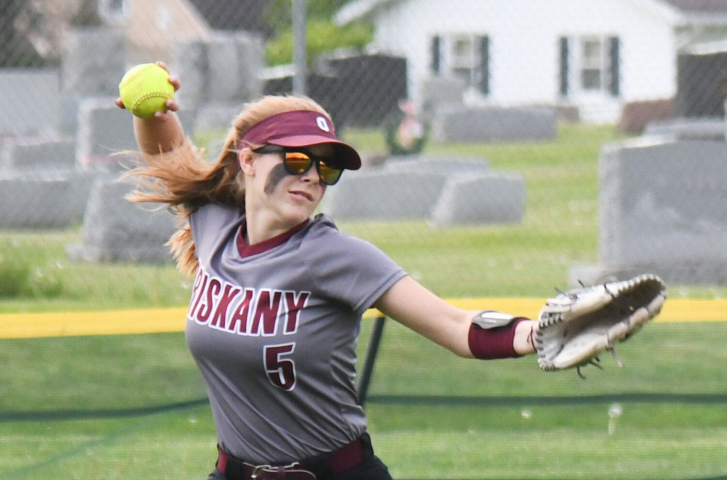 Oriskany's Peyton Buehler makes a throw from the outfield against Poland on Friday.