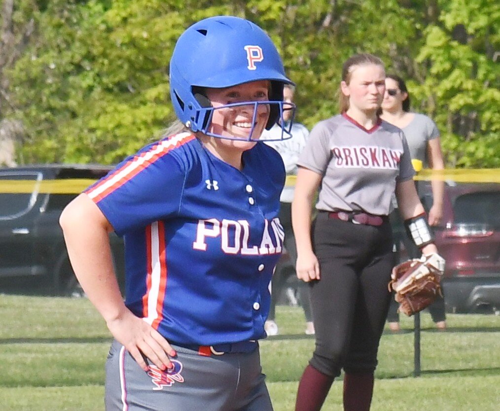 A Poland player celebrates after a hit on Friday against Oriskany.