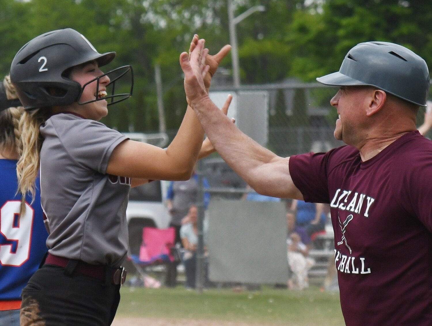 Juliet Tagaliaferri celebrates a walkoff triple to give Oriskany a 3-2 win over Poland on Friday. The win helped give Poland the Center State Conference Division III title.