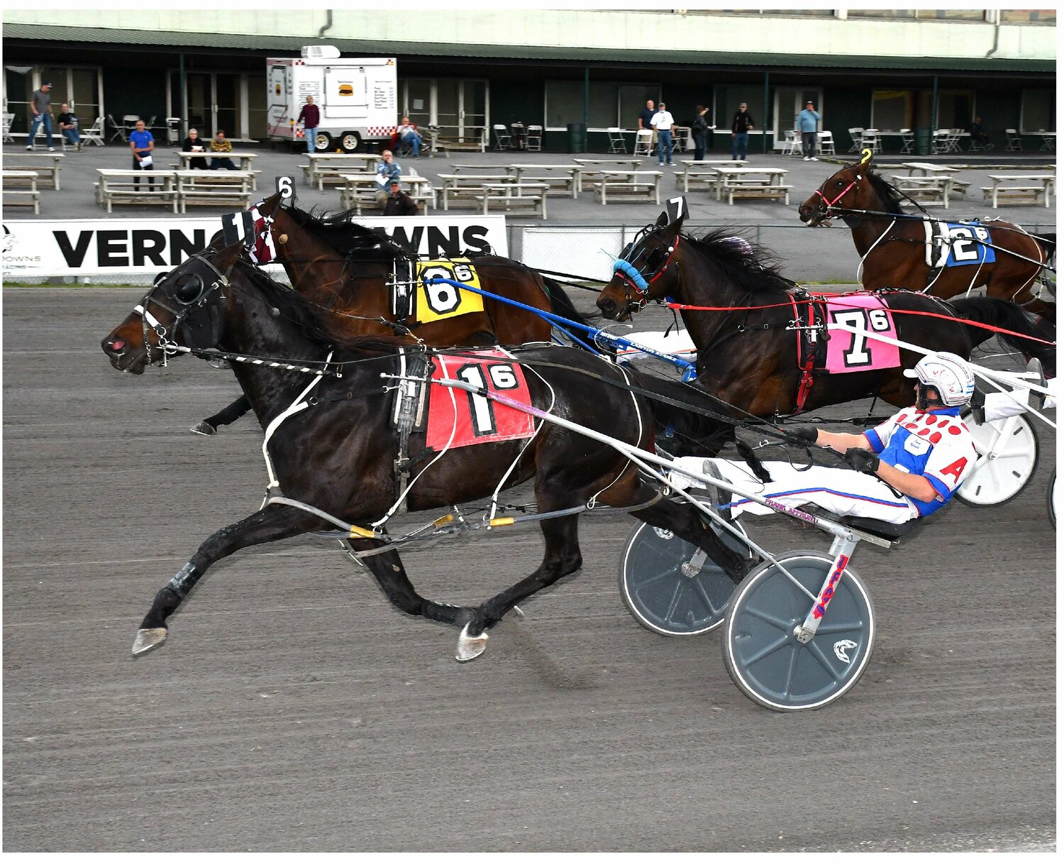 Lorrie Sue with driver Frank Affrunti charged late to capture the $6,500 fillies and mare pace on Friday at Vernon Downs.