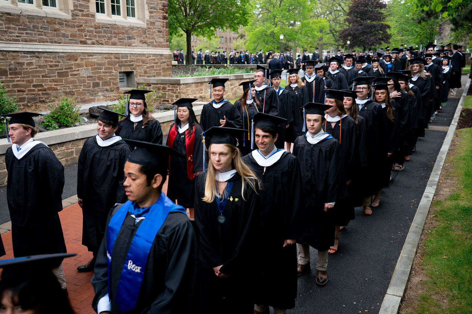 Graduates line up to process into commencement exercises at Hamilton College on Sunday, May 21.  Some 500 graduates received their degrees during the ceremony.