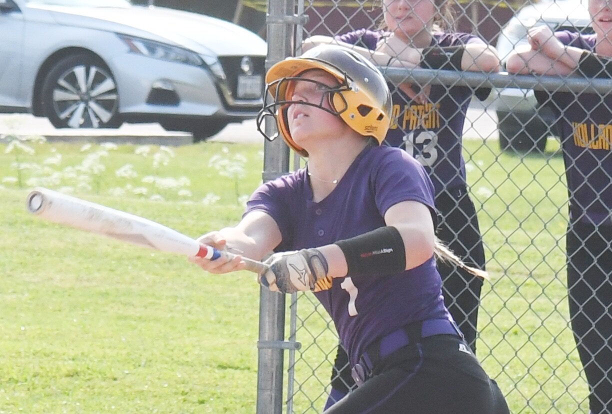 Holland Patent’s Maggie Cummings watches her long fly ball against Clinton in a Section III Class B first-round tournament game. Cummings had multiple extra-base hits in Holland Patent’s 22-1 win in five innings Monday.