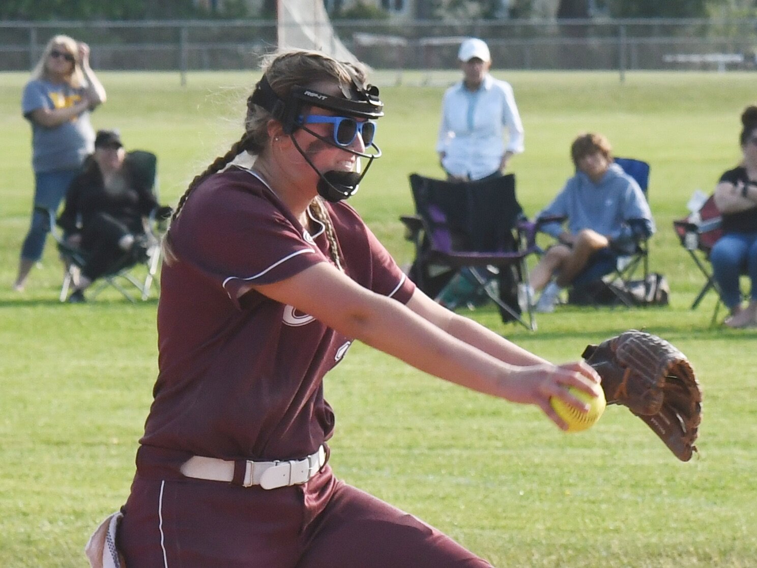 Clinton's Chloe White throws a pitch during a Section III Class B first-round tournament game against Holland Patent on Monday. Clinton fell 22-1.