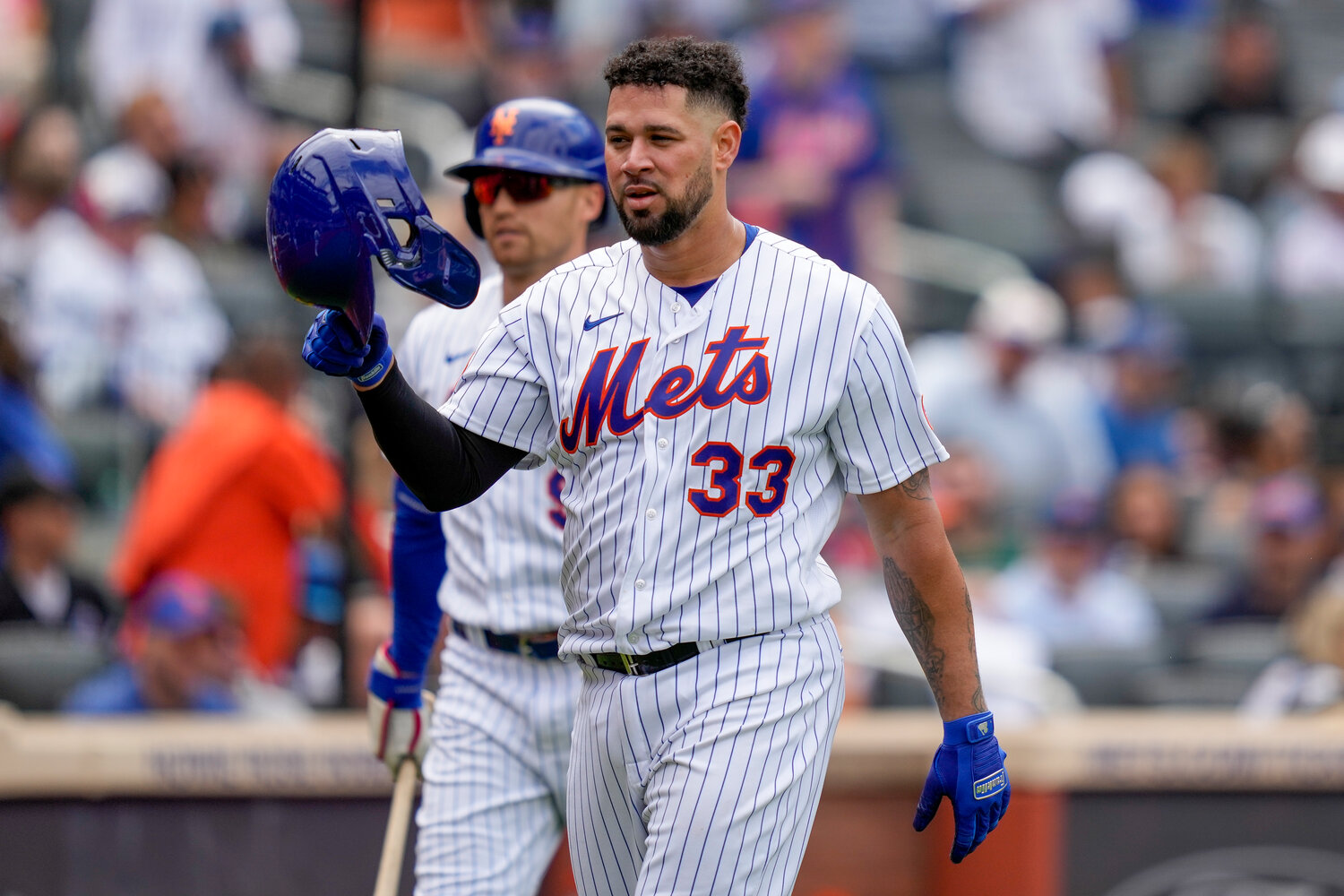 New York Mets' Gary Sánchez reacts after being tagged out at home by Cleveland Guardians catcher Mike Zunino in the fourth inning of the opener of a split doubleheader on Sunday in New York.