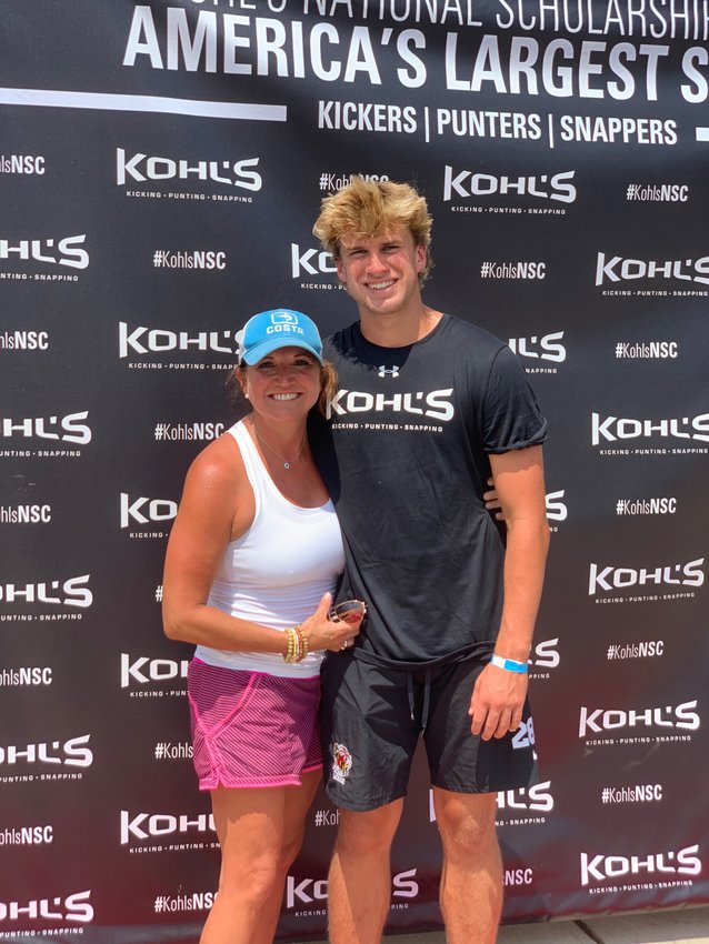 Trey Smack and his mother, Libby, at the Kohl's Kicking National Scholarship Camp in Tennessee in July