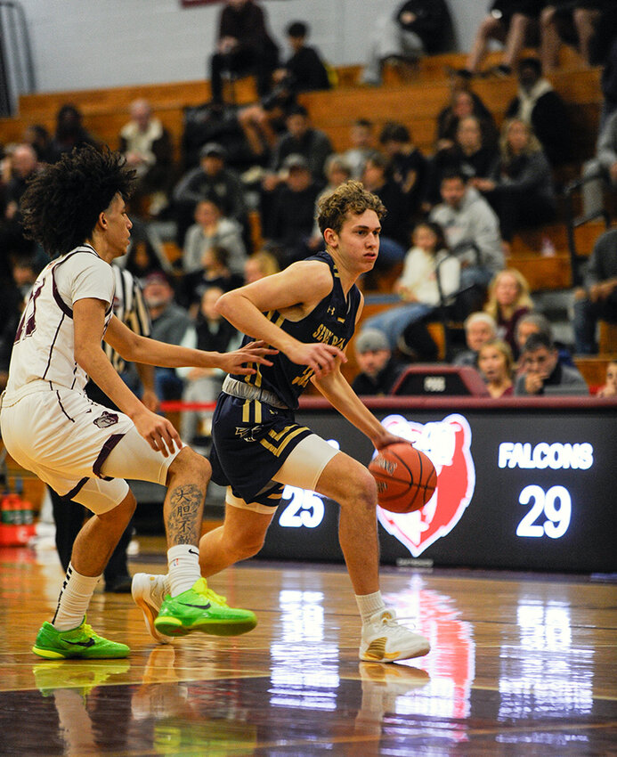Brendan Abell drove the lane as part of a 16-point effort in Severna Park’s win over Broadneck on February 2.
