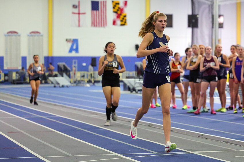 Ava Zimmerman, pictured at the indoor track county championships in January, took first in the 800-meter run during regionals and also helped the Falcons win two relay races.
