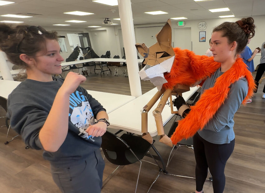 Puppet artist Trishelle Weed and puppet operator and member of the teen ensemble Mallory Owen have been practicing with an almost finished fox puppet for Woods Church’s production of “The Secret Garden.”