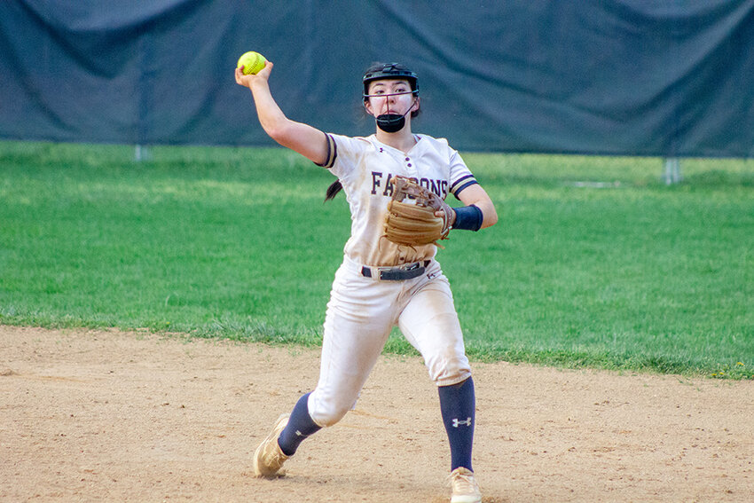 Severna Park’s Jennifer Hong attempted to throw out a runner at first base.