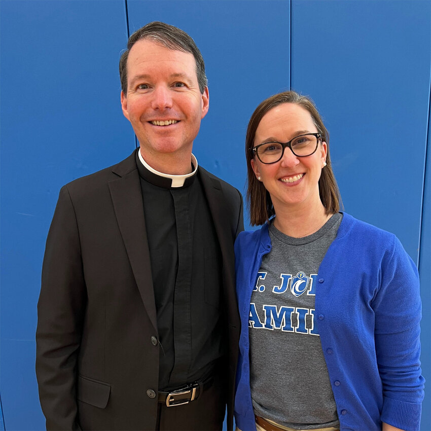 The Rev. Erik Arnold introduced Glenna Blessing as new principal of St. John the Evangelist School.
