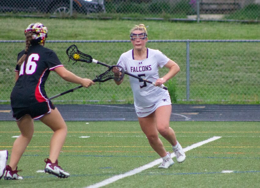 Peyton Jeffers (5) drove to the net for one of her two goals against Linganore.