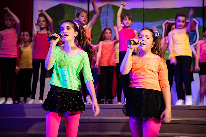 Fourth- and fifth-graders sang their hearts out and danced the night away at opening night of Shipley’s Choice Elementary School’s 13th-annual “Rock & Roll Revival” on May 4. Themed “A Musical Road Trip,” the show featured scores of students performing 20 hits new and old, ranging from The Jackson 5’s “ABC” to Avril Lavigne’s “Complicated.”