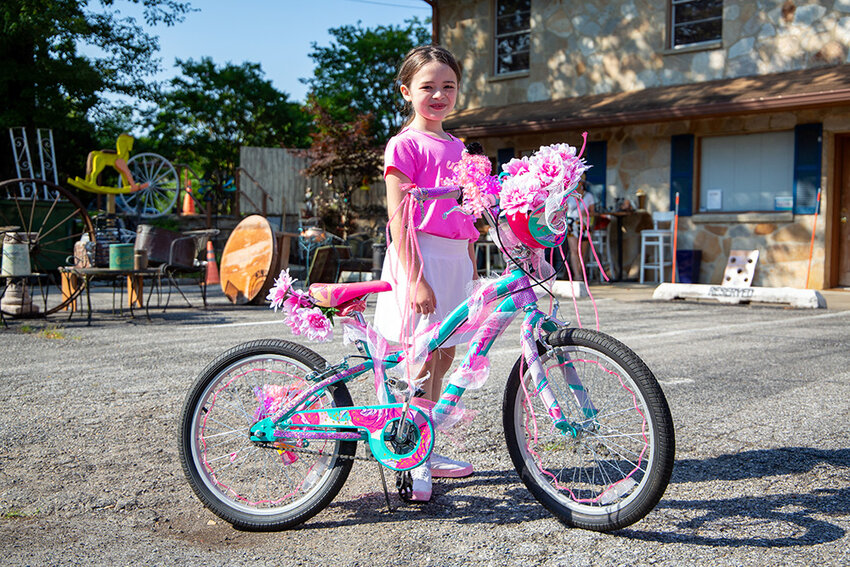 Reyna Laningham adorned her bike with pink decorations, earning her the prize of Most Original.