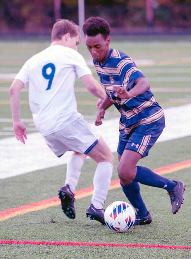 Severna Park's Eneko Allen dribbled past a South River defender during the Falcons’ county championship win last October.