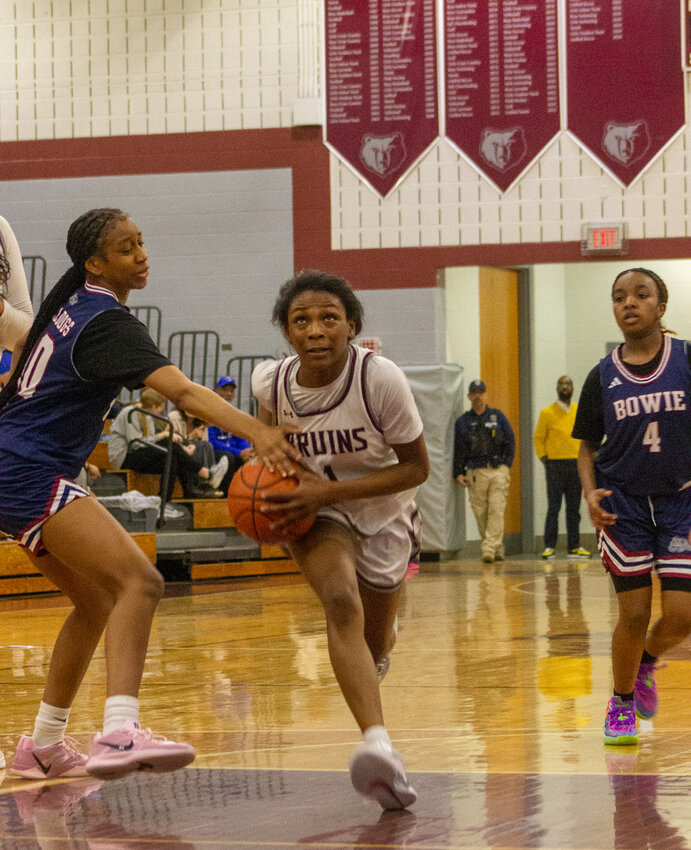 Broadneck’s London Best (1) fought through traffic during the Bruins’ game against Bowie on February 28.