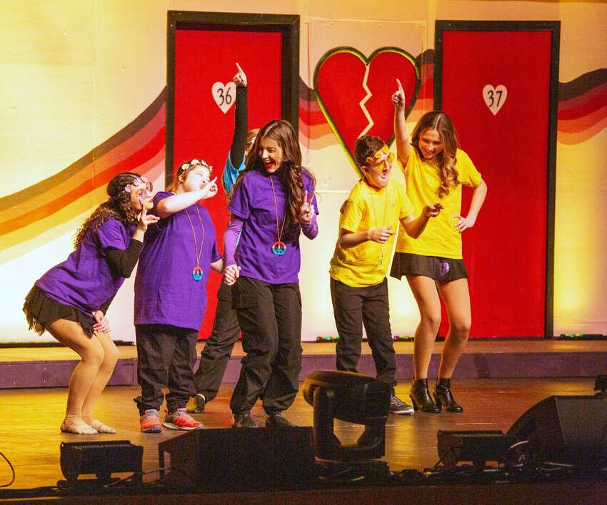 Shelby Comboy (second from left) and William Leizear (second from right) stole the show with their dance moves.