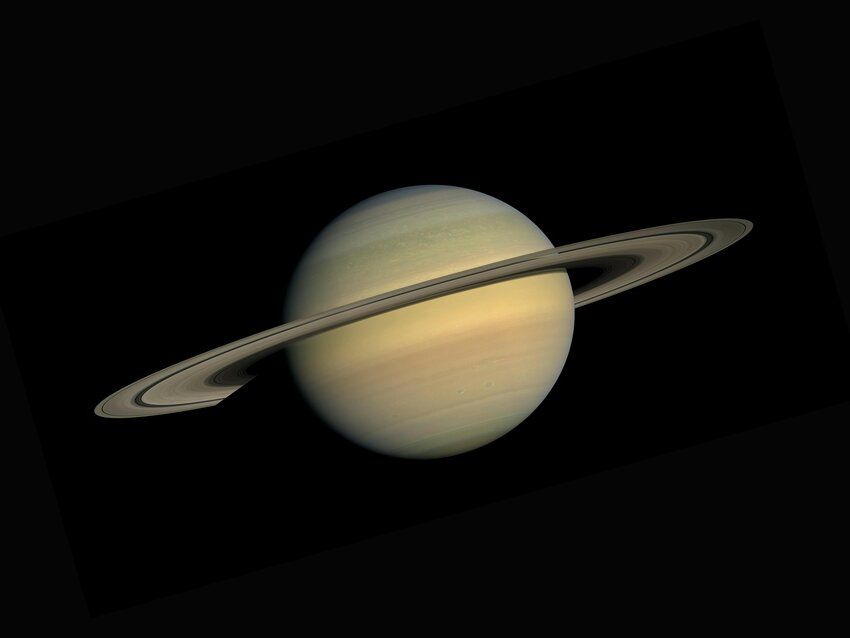 Saturn, as seen from the Cassini–Huygens space-research mission, is the sixth planet from the sun, both in the solar system and along the Planet Walk on the B&A Trail.