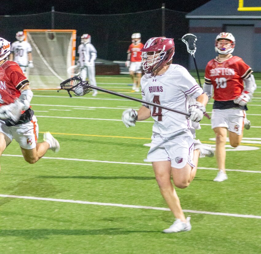 Noah Yoder helped anchor a stingy defense against Crofton, including this solo breakout effort.