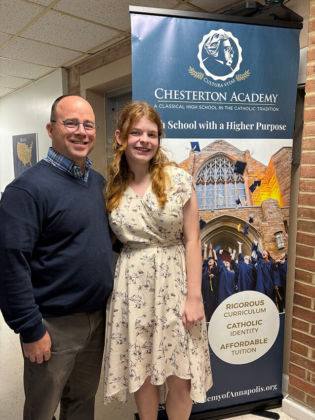Bethany Farber posed with her favorite Chesterton Academy educator, Tim Feeney.