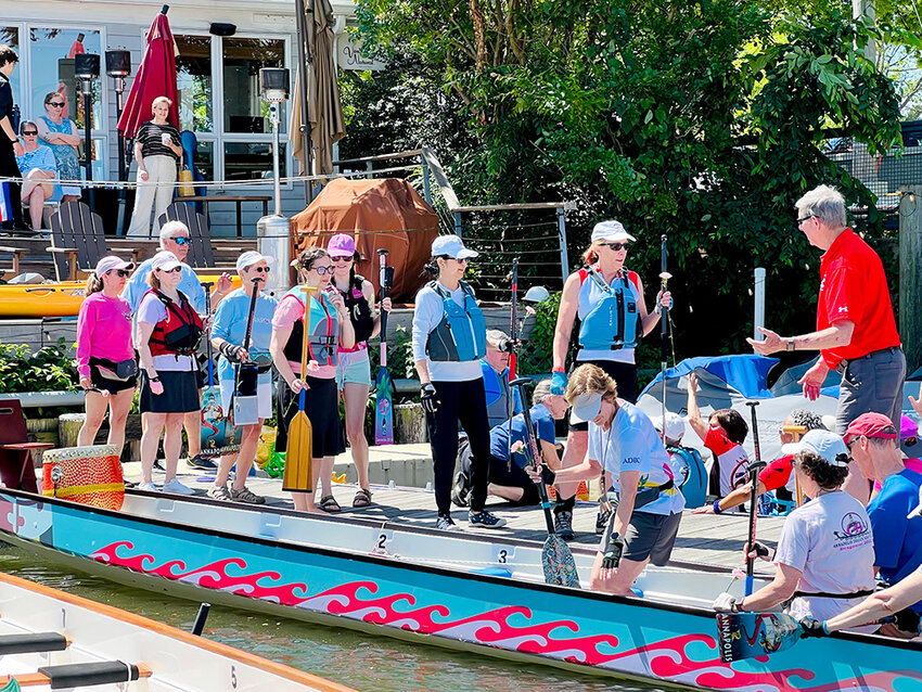 Forty paddlers, two drummers and two steersmen from the Annapolis Dragon Boat Club quietly pushed their boats back from the Fourth Street Pier 4 into Spa Creek on May 17 as part of the annual Awaken the Dragon ceremony.