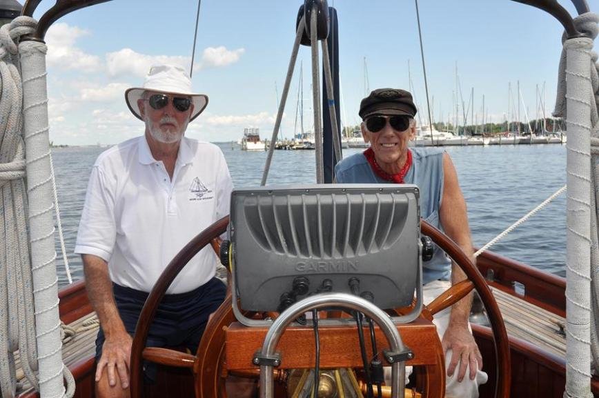 Owner David Butler (left) and Captain Paul Itzel have pieced together the remarkable history of the 112-year-old yacht known as the Witchcraft.