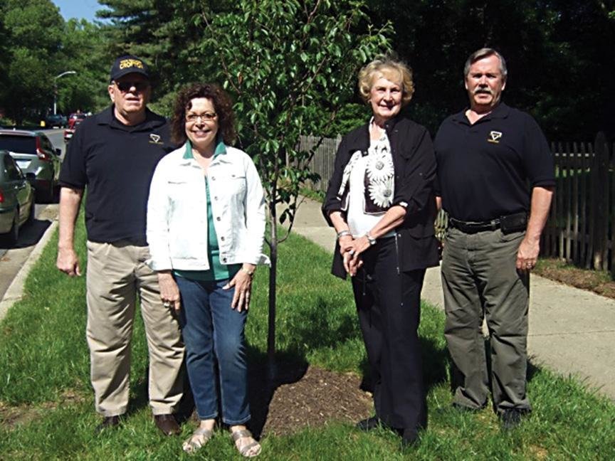 Larry Schweinsburg, Marcia Richard, Jane McClanahan and Steve Grimaud recently attended the planting ceremony to beautify Crofton Parkway with cherry trees as part of a project by the Crofton Village Garden Club.