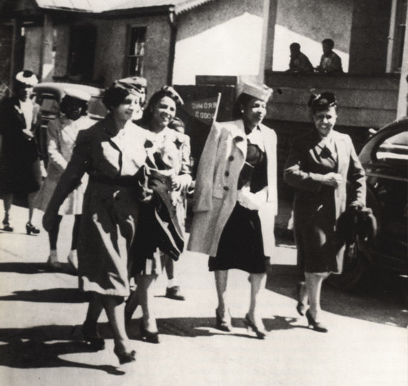 Sarah V. Jones (front left), seen here leading a group of teachers in a parade coming down Washington Street, was the first female superintendent of AACPS.