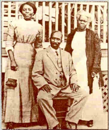 Wiley H. Bates (center), seen here with wife Annie King Bates (left) and mother Harriet Williams, sold the land to AACPS that would eventually become Bates Middle School.