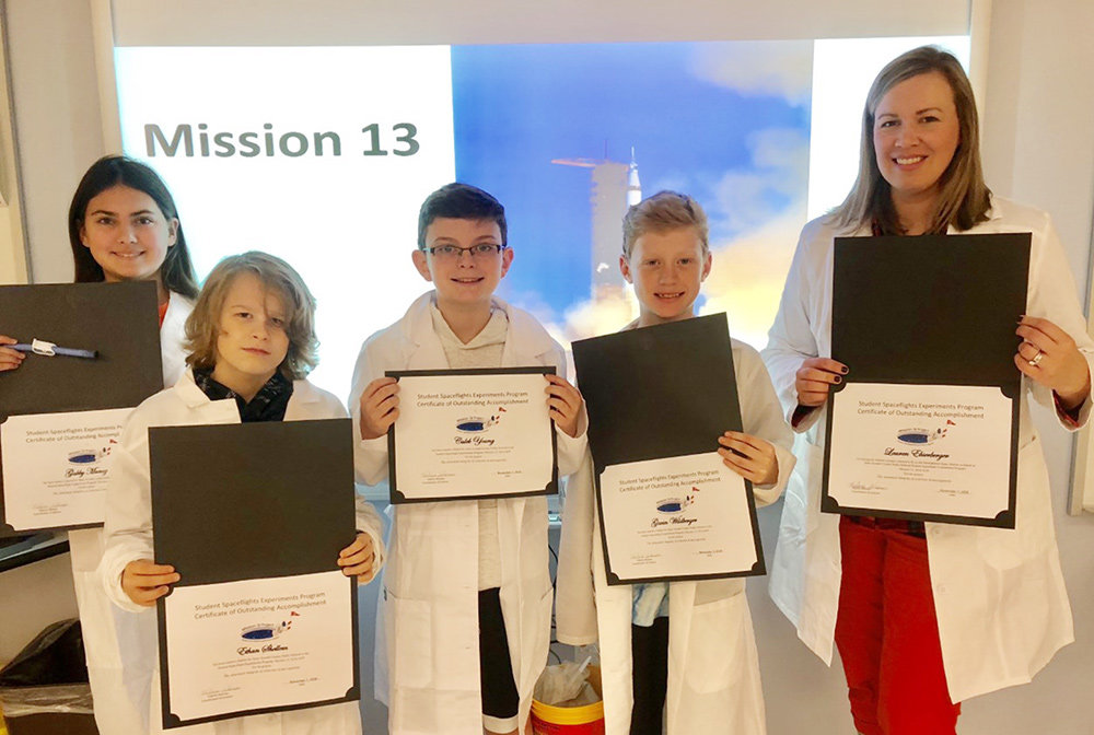 MRMS sixth-graders Caleb Young, Ethan Shellem, Gavin Wildberger and Gabby Munoz created a project that will be sent into space in July.
