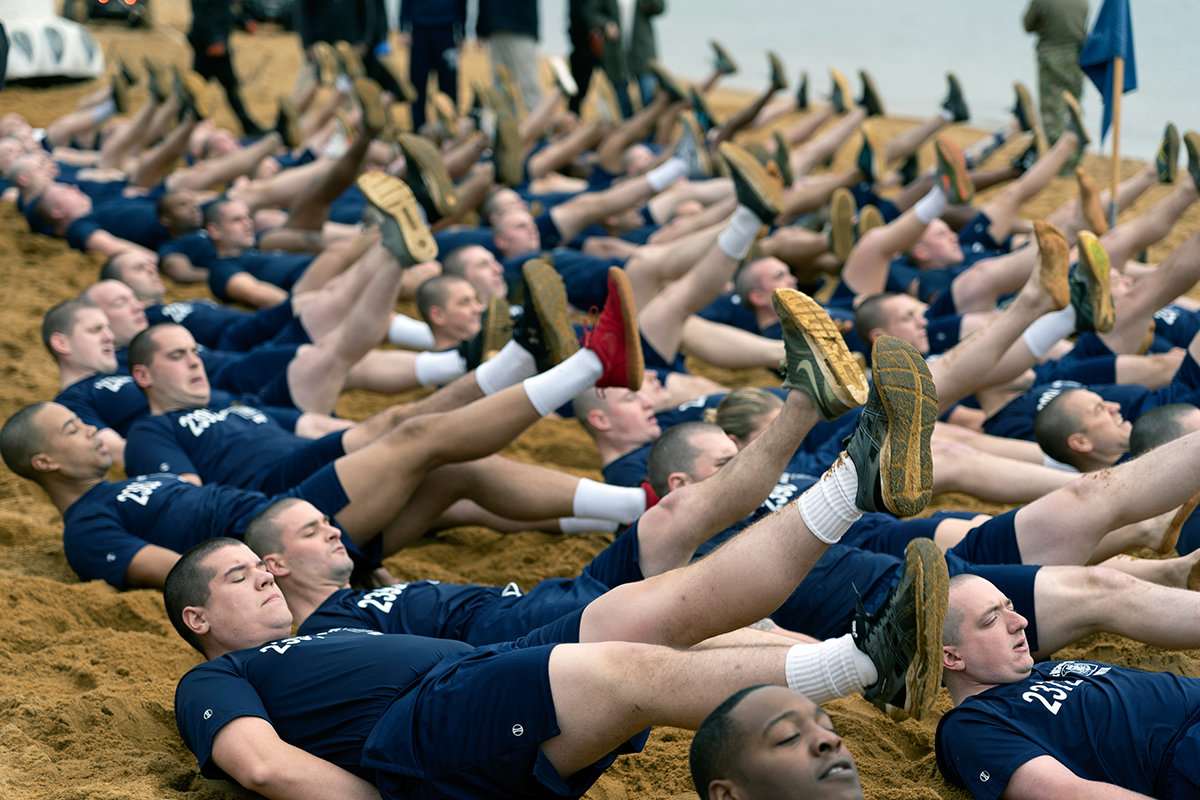 Cadets from the 90th Police Academy performed warm-up exercises in preparation for the Polar Bear Plunge.