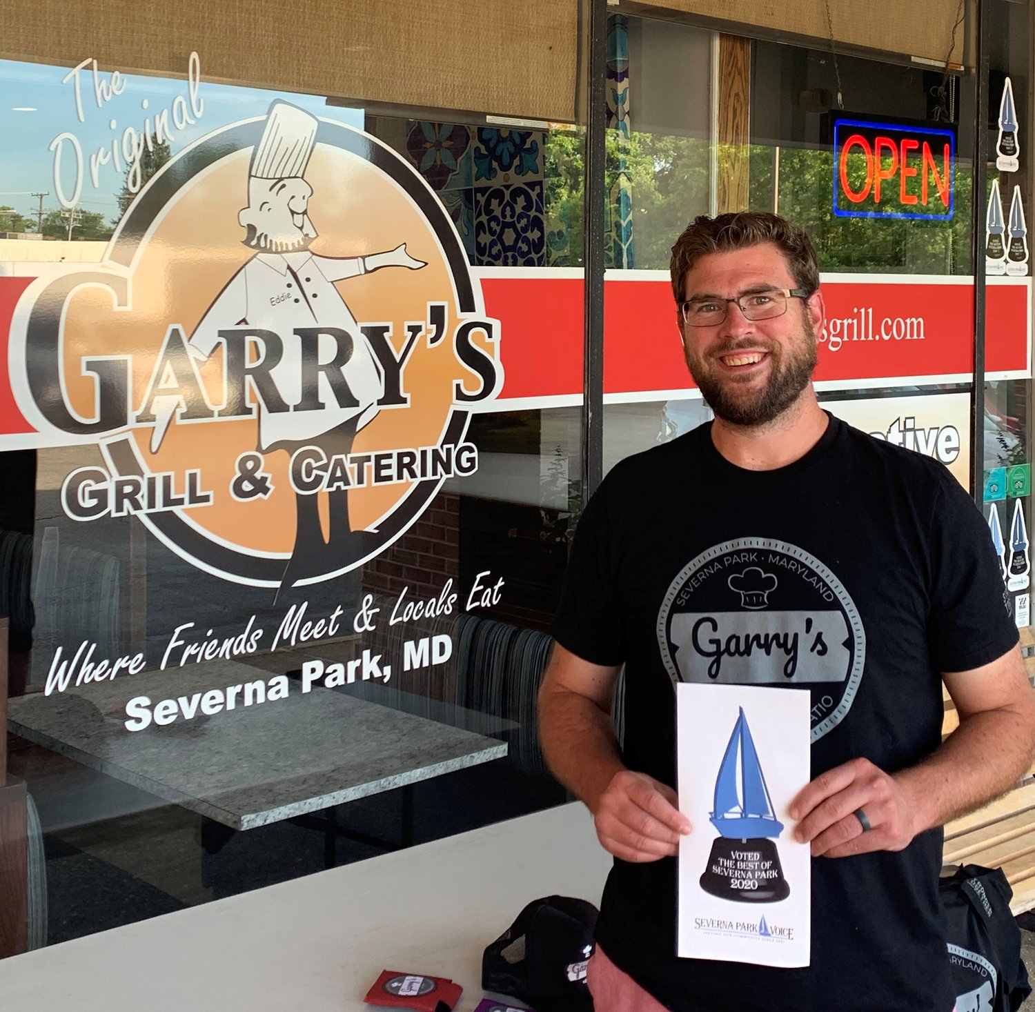 Garry's Grill owner Eddie Conway was proud to accept his restaurant's award for Best Wait Staff, Best Lunch and Best Salad.