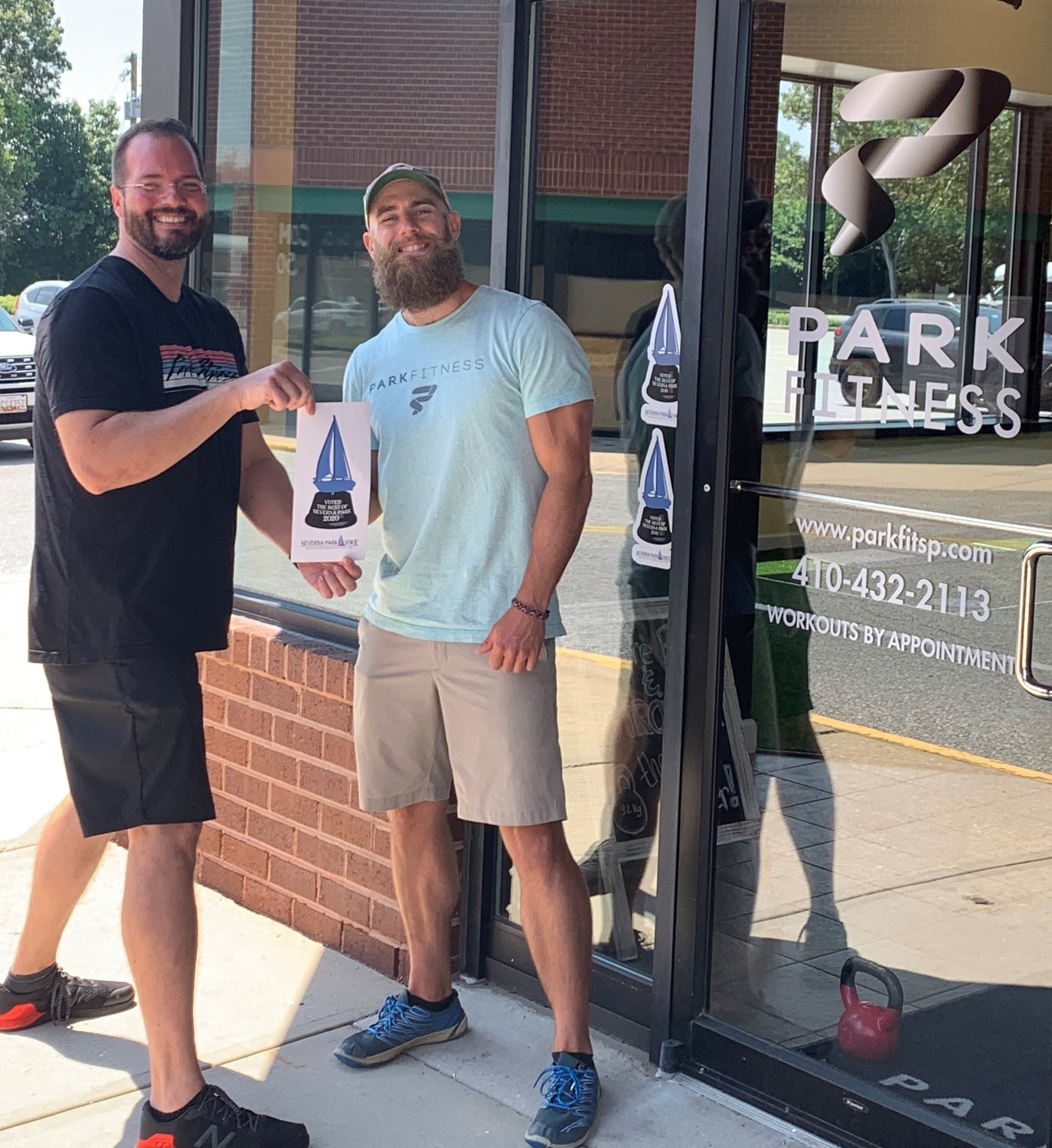 On behalf of Park Fitness, Joe Bocek (left) and Danny O’Malley accepted the Best Of award for Best Fitness Club, Best Weight Loss Program, and Best Overall Customer Service.