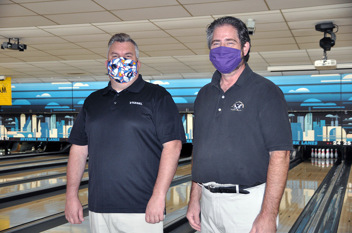 Severna Park Lanes owner Mike Hall (left) and manager Curt Pezzano are trying to provide a safe environment for their customers.