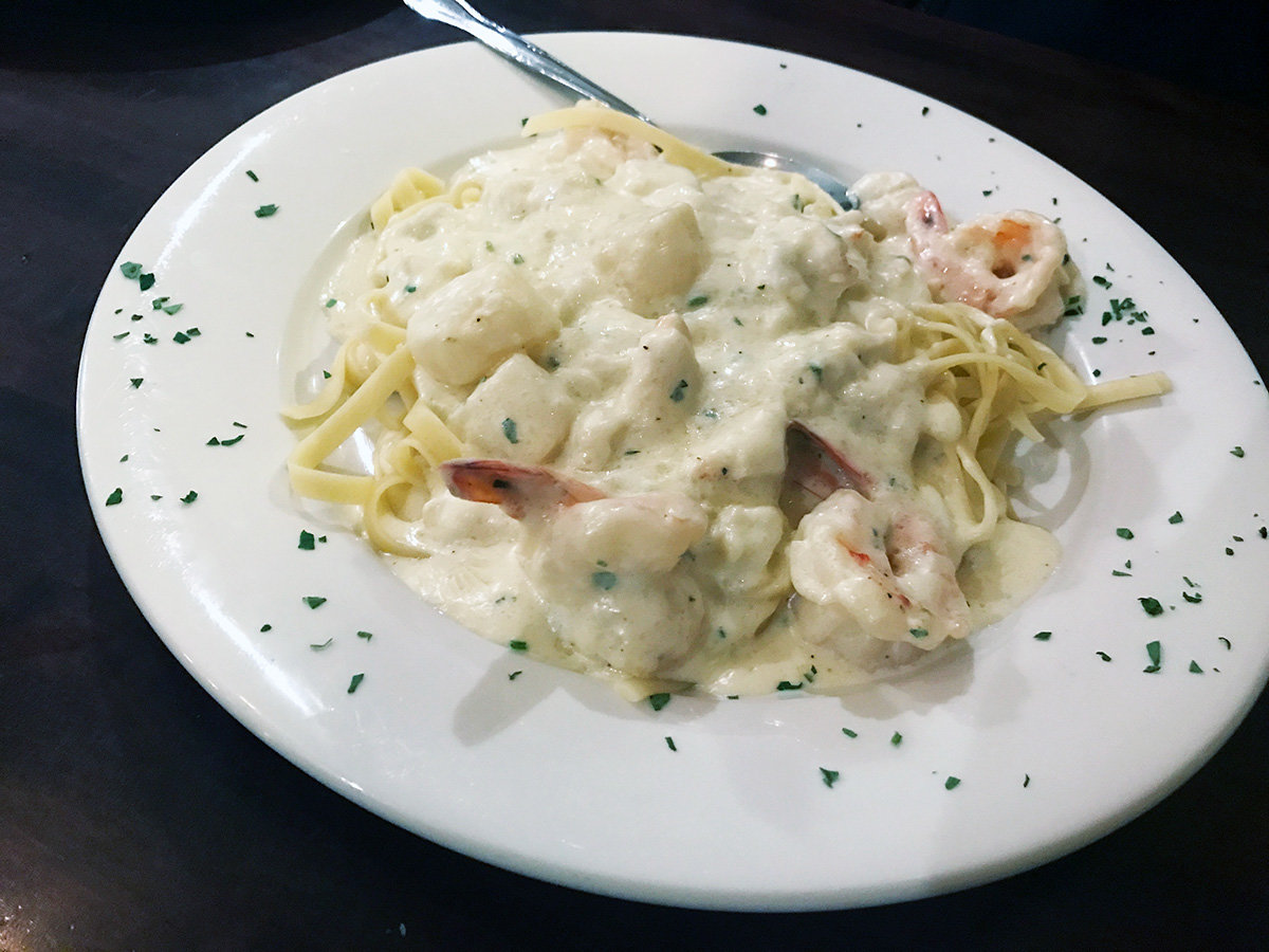The fettuccine Mediterranean featured scallops, shrimp and crab, and was topped with a delicately flavored white sauce.