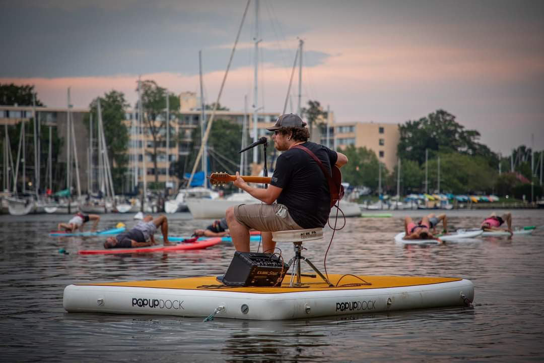Last summer, Aaron Yealdhall, known as Skribe, played a socially distanced paddleboard yoga concert by Capital SUP in Annapolis.