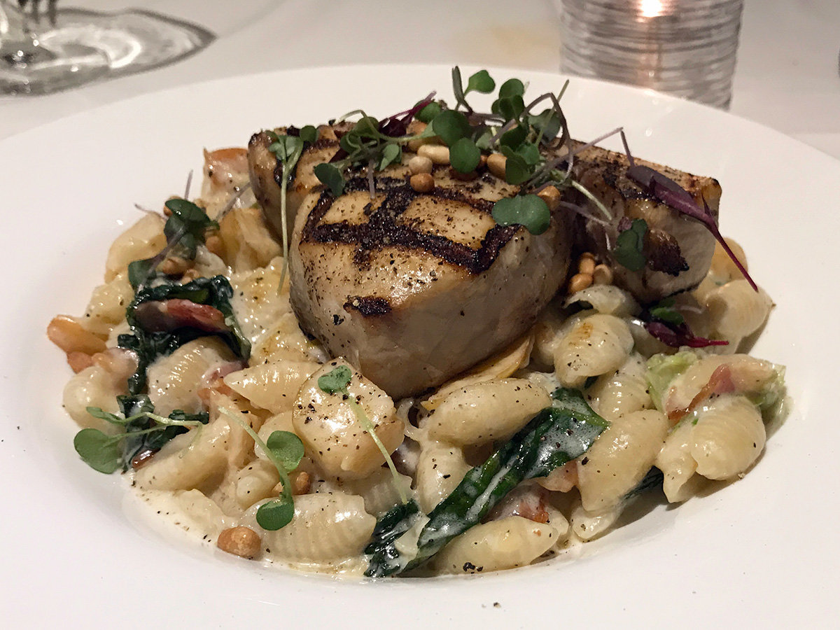 The swordfish Portofino paired a deep-sea briny taste with the smooth cavatelli pasta in a velvety parmesan cream sauce with apple, bacon, and toasted pine nuts.