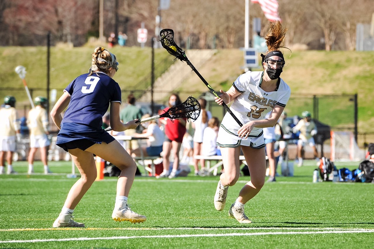 Megan Bunker, a senior, netted her milestone goal in the opening minutes of the Eagles’ victory on March 26.