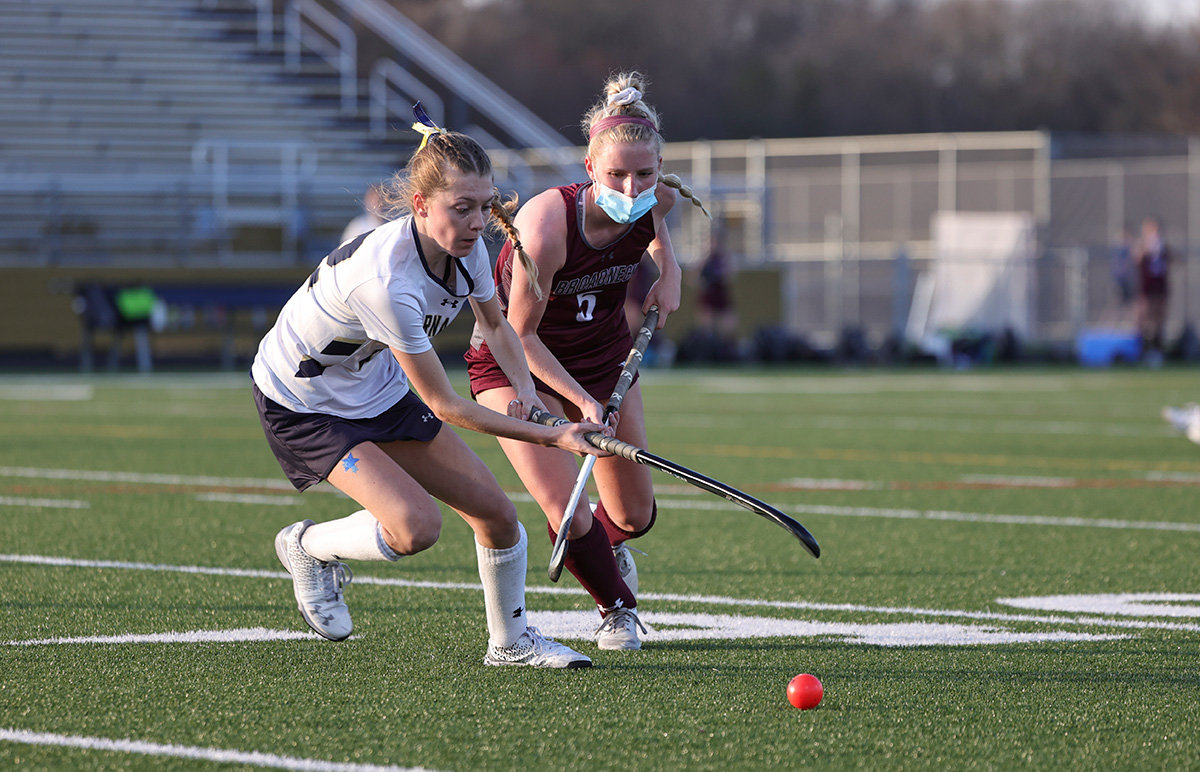 Delanie Abere (Severna Park) and Christine Liethof (Broadneck) battle for control of a ball early in the game.