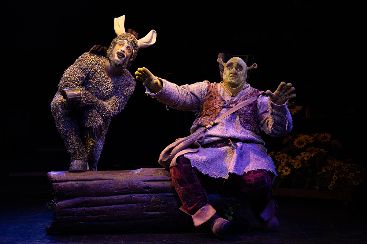 Bryan Jeffrey (Donkey) and Russell Sunday (Shrek) star in the Toby’s Dinner Theatre production of “Shrek: The Musical,” open now through June 13.